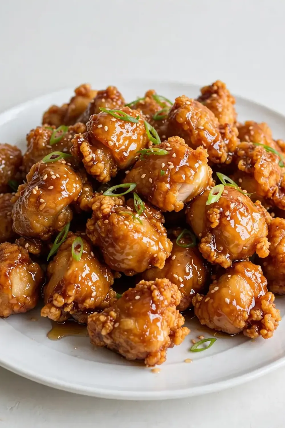crispy chinese honey chicken on a plate